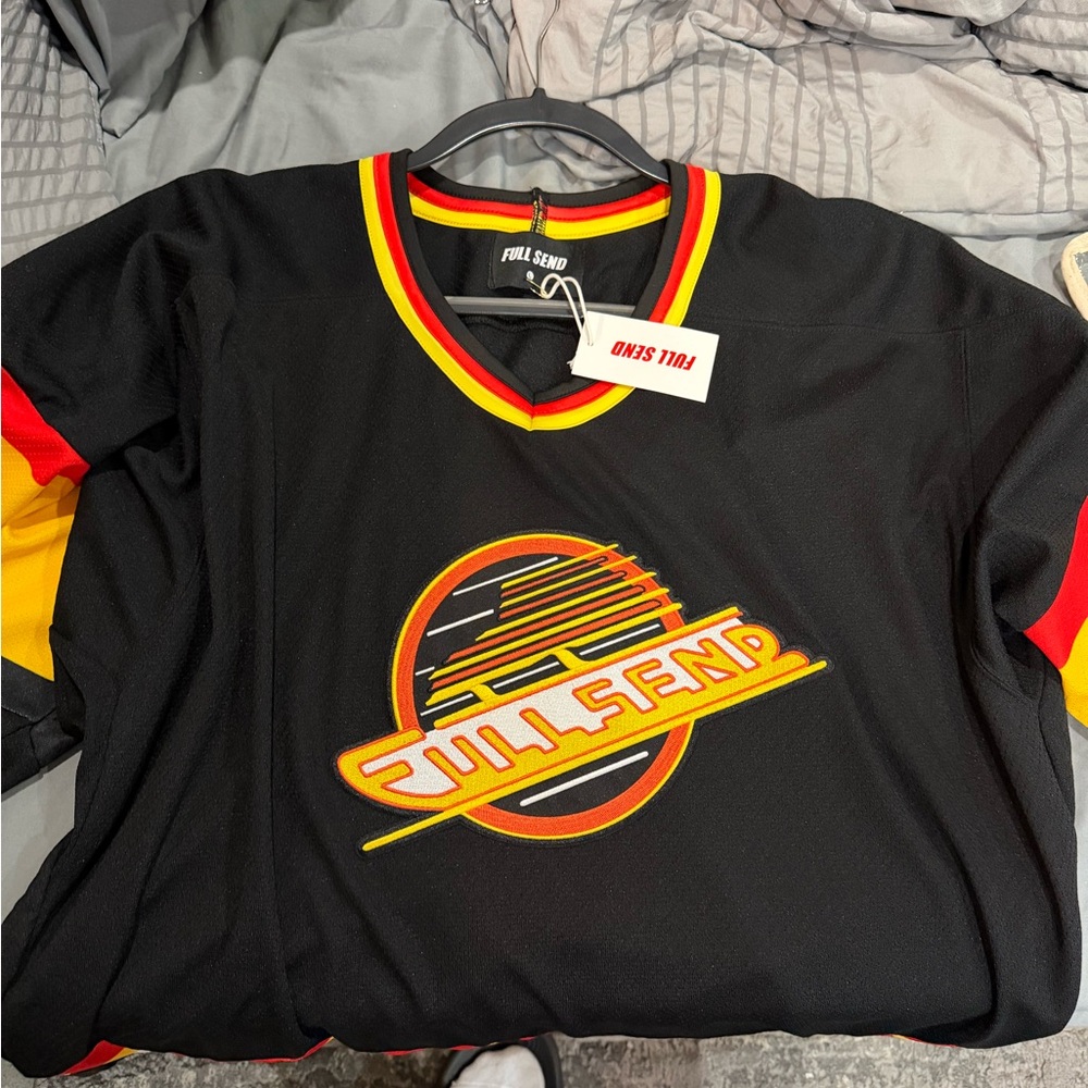Vintage Black Jersey with Red and Yellow Accents